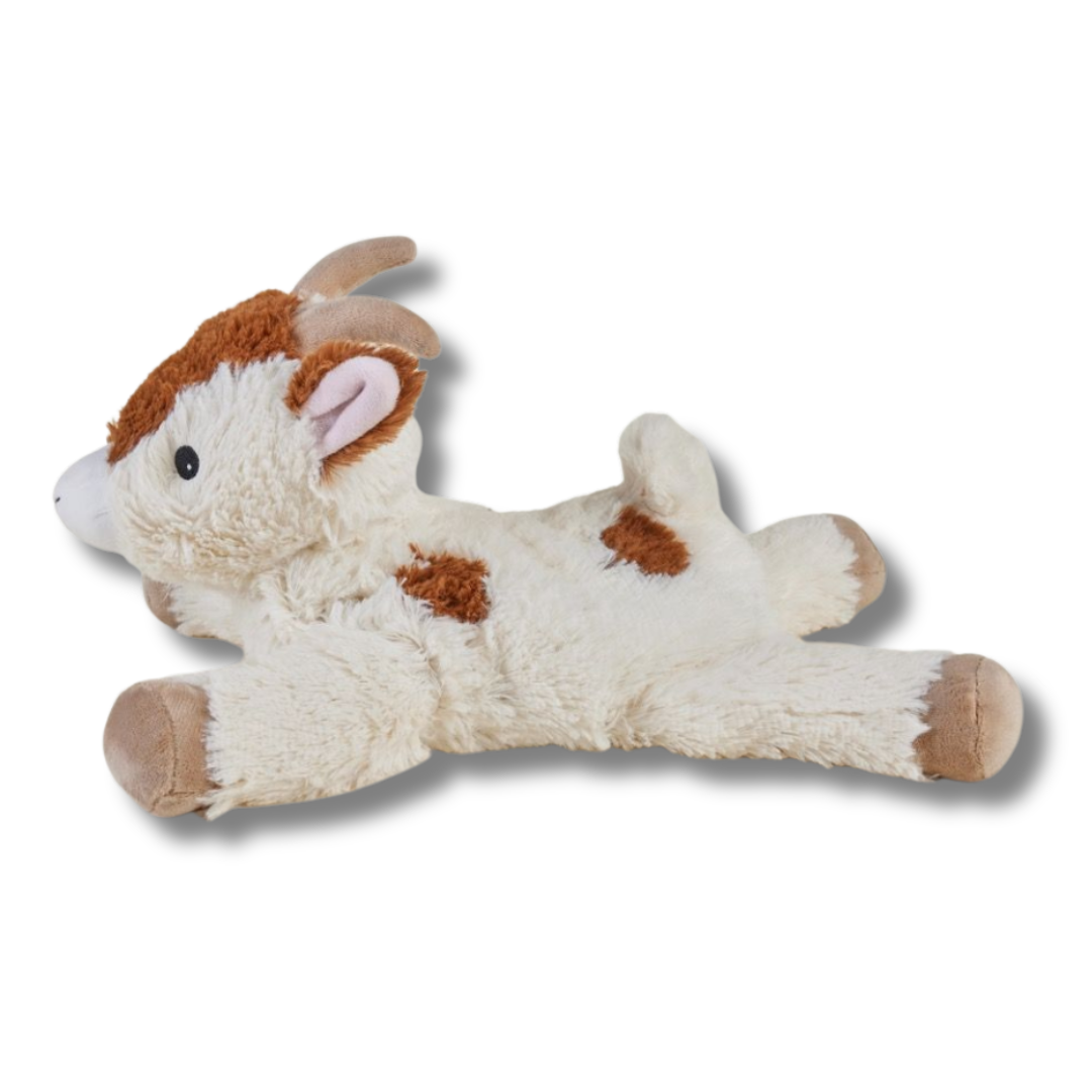 Plush toy goat on a white background